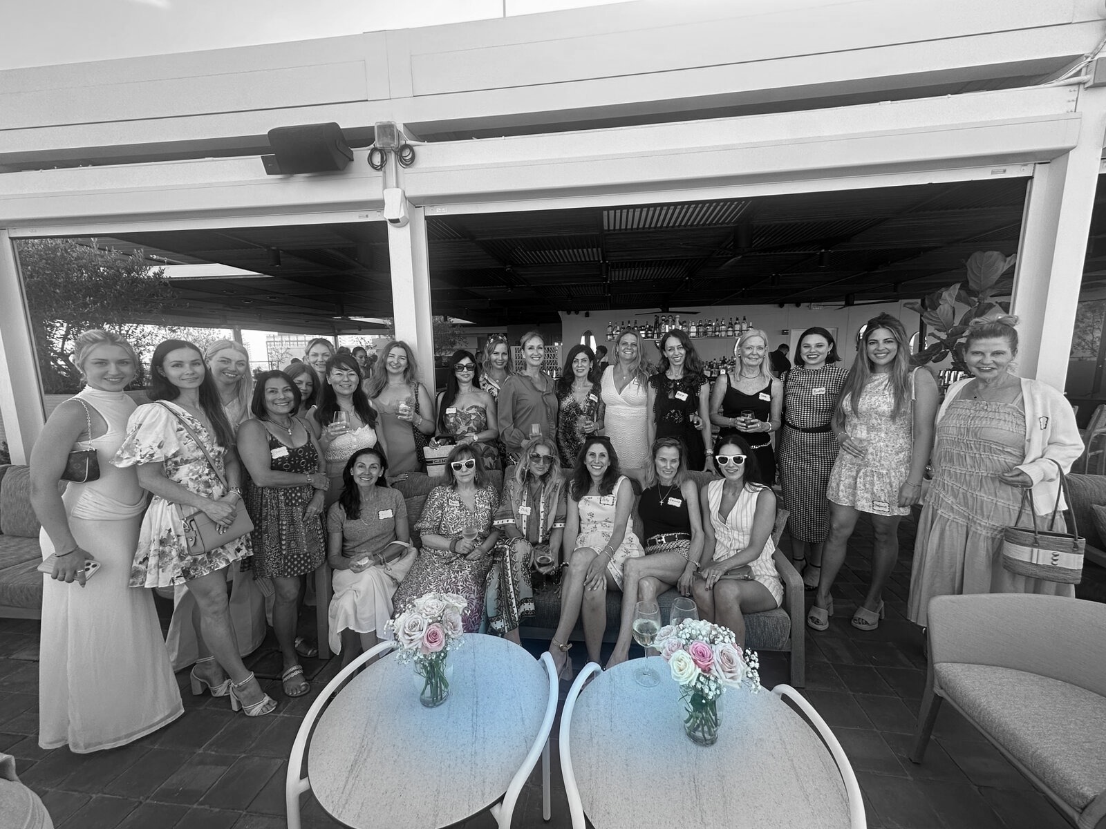The founding gathering — women on the rooftop in Palm Beach